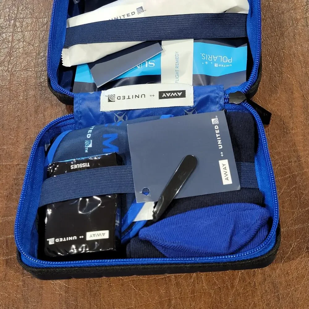 New AWAY Travel The Mini Suitcase Toiletry Case United Polaris Amenity Kit Pouch